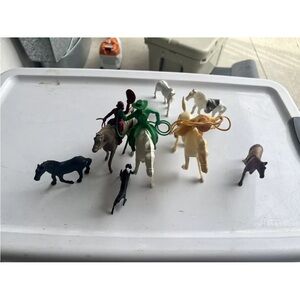 Vintage plastic cowboys and horses
